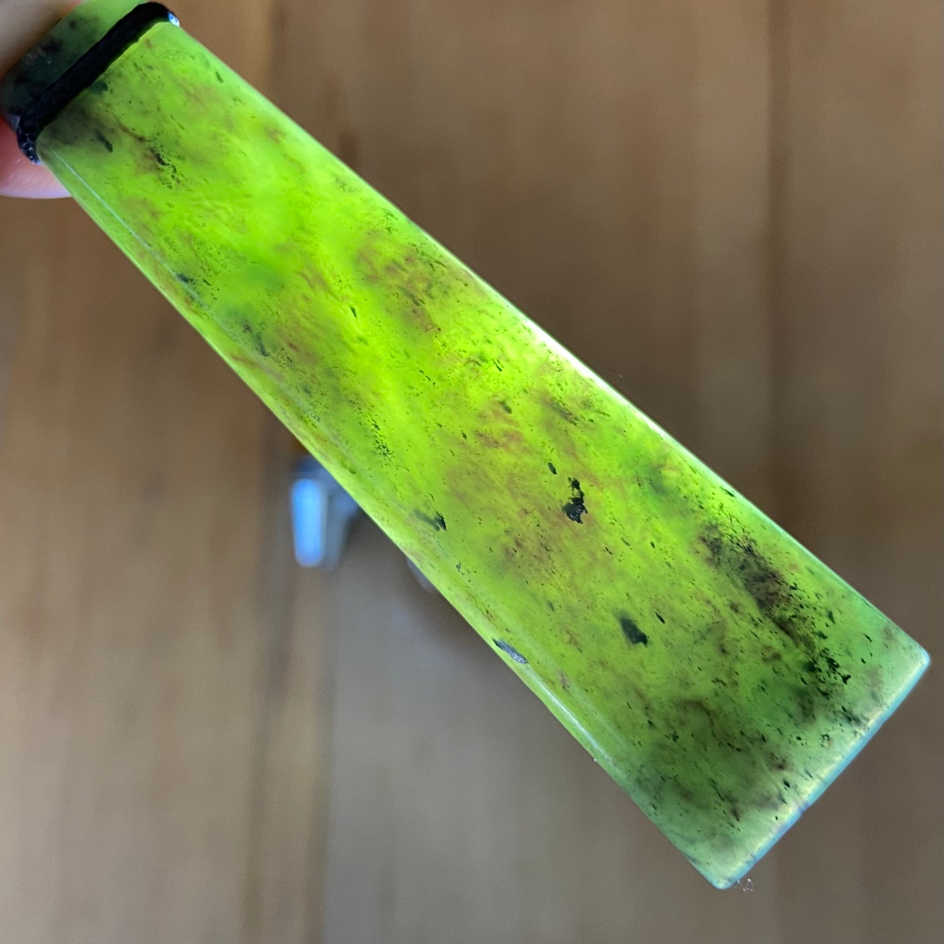 Pounamu toki from New Zealand Kawakawa pounamu (greenstone).Translucency.