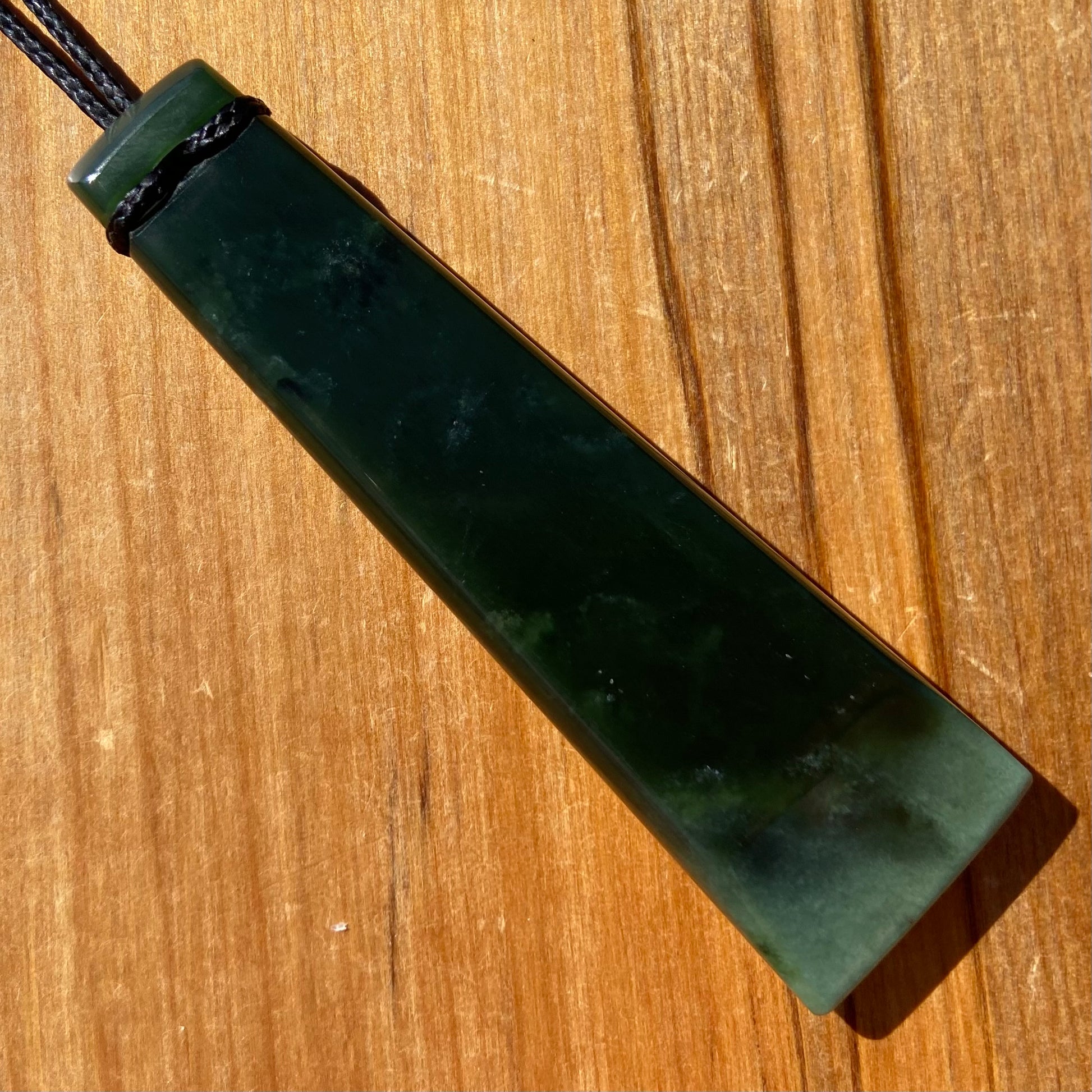 Pounamu toki from New Zealand Kawakawa pounamu (greenstone). Back.