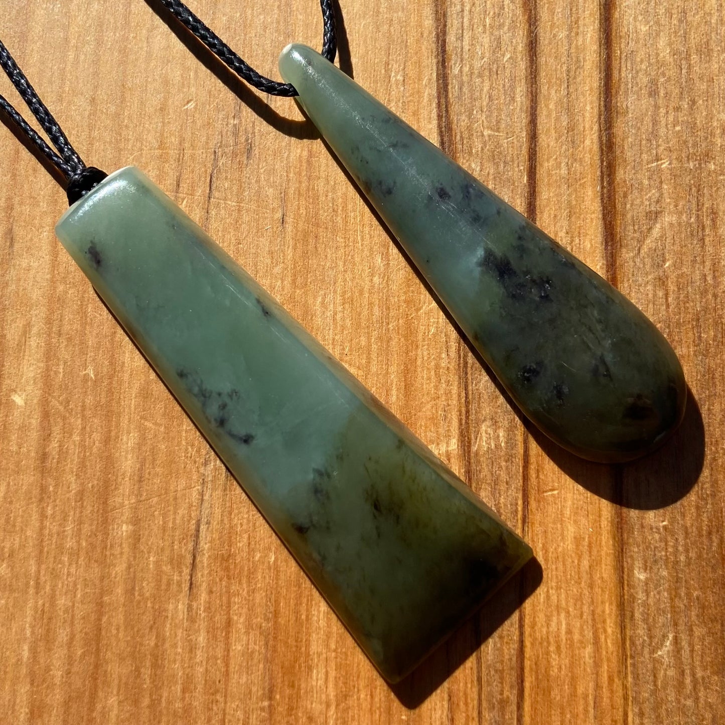 Toki and roimata pendant set hand-carved from New Zealand inanga pounamu (greenstone). Front