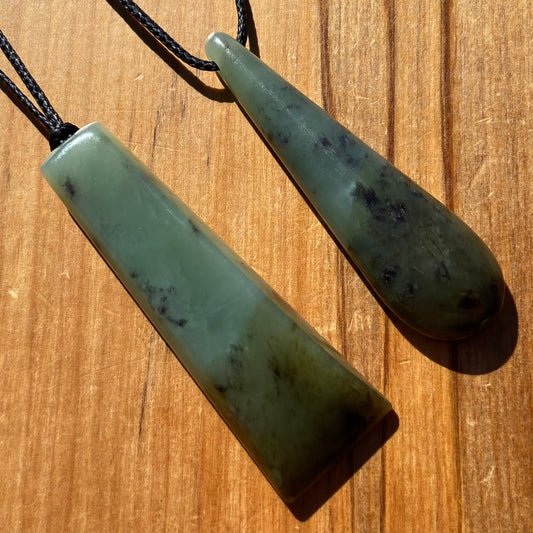 Toki and roimata pendant set hand-carved from New Zealand inanga pounamu (greenstone). Front