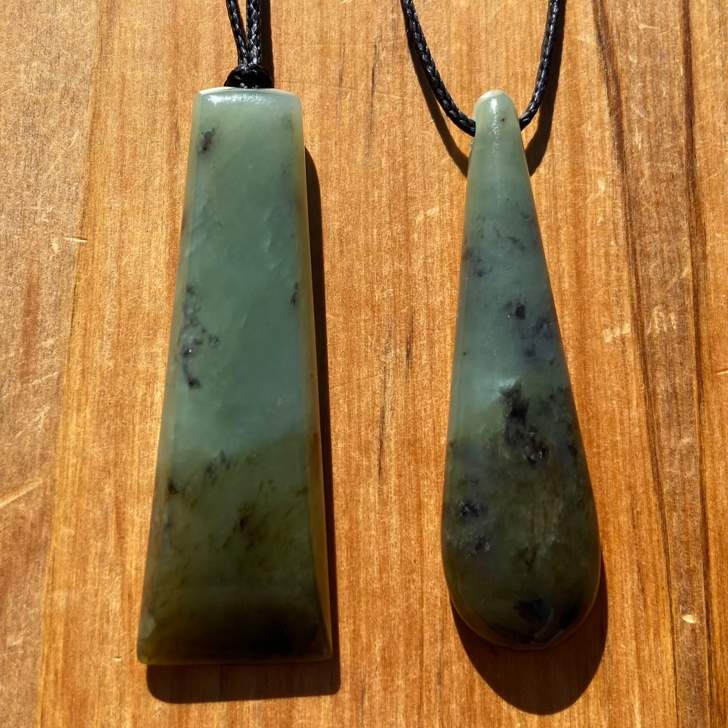 Toki and roimata pendant set hand-carved from New Zealand inanga pounamu (greenstone). Front