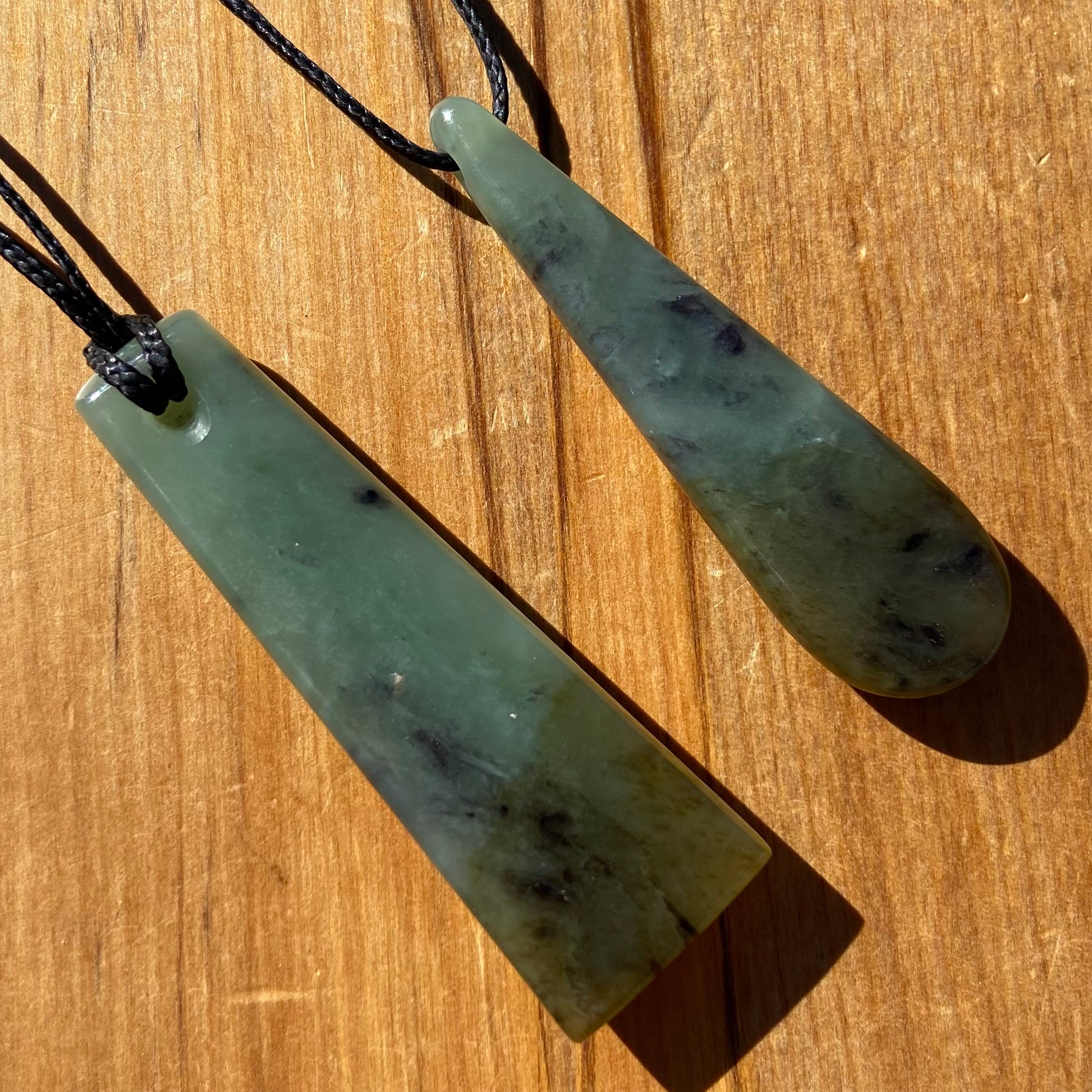 Toki and roimata pendant set hand-carved from New Zealand inanga pounamu (greenstone). Back.
