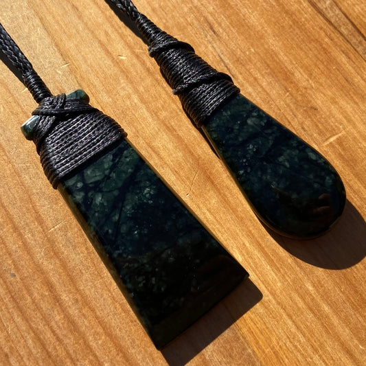 Bound toki and roimata pendant set hand-carved from New Zealand tangiwai pounamu. Front