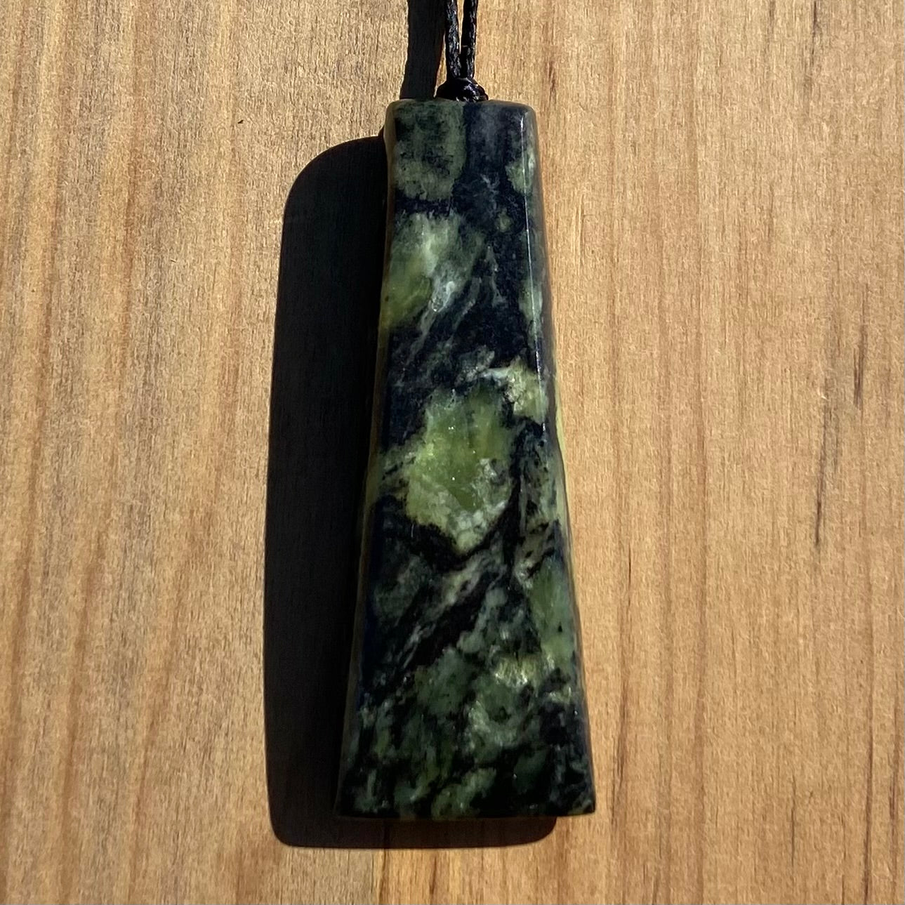 Toki pendant hand-carved from New Zealand Douglas Creek pounamu (greenstone). Front.