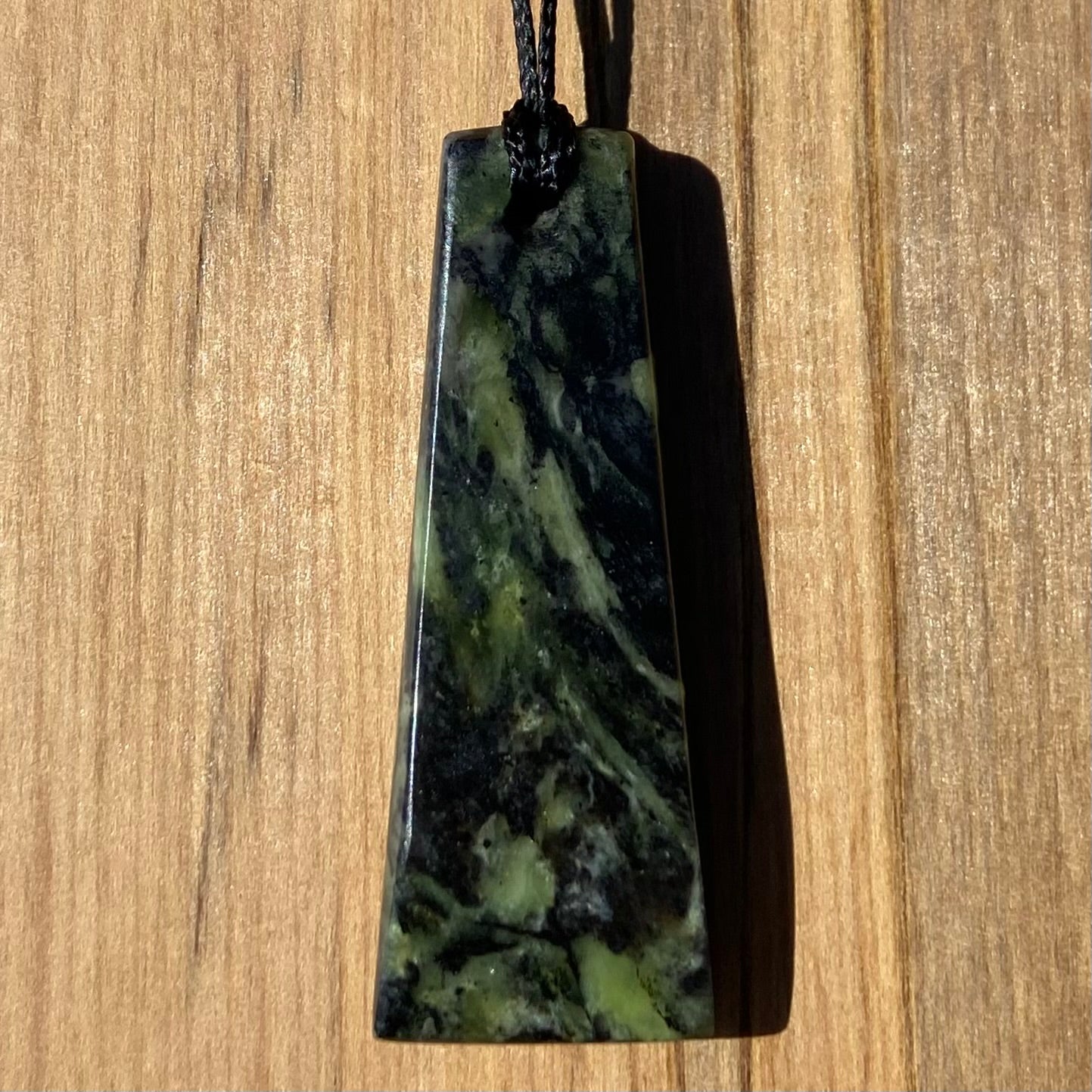 Toki pendant hand-carved from New Zealand Douglas Creek pounamu (greenstone). Back.
