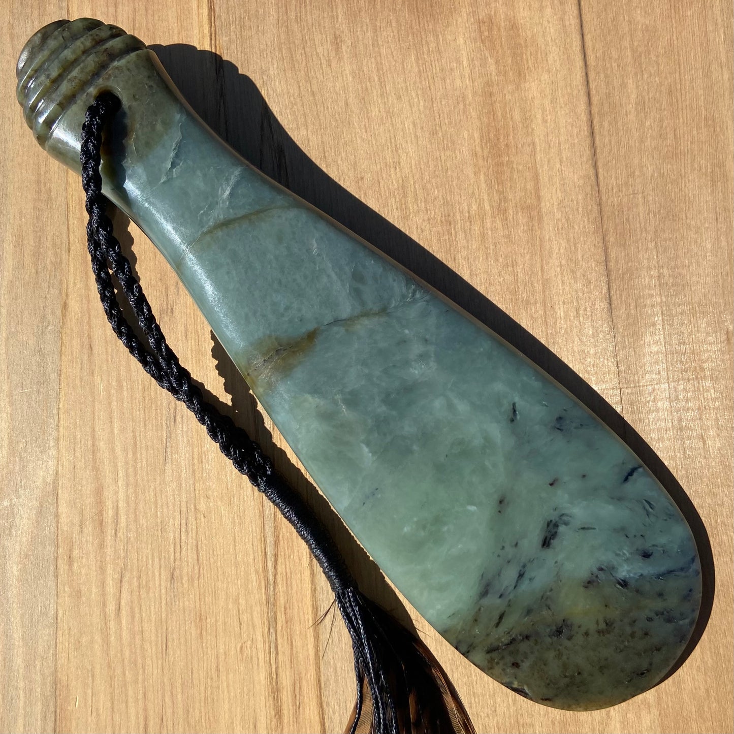 Pounamu mere hand-carved from South Westland Inanga pounamu (greenstone). Front.