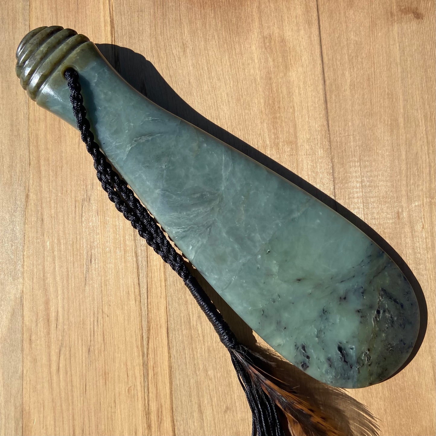 Pounamu mere hand-carved from South Westland Inanga pounamu (greenstone). Front.