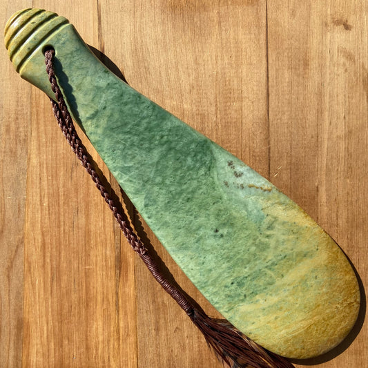 Pounamu mere hand-carved from Marsden flower jade pounamu (greenstone). Front.