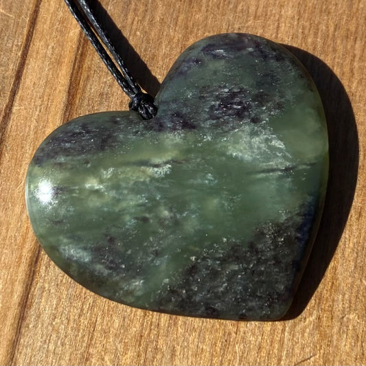 Heart pendant hand-carved from New Zealand pounamu (greenstone)Totoweka Jade. Front.