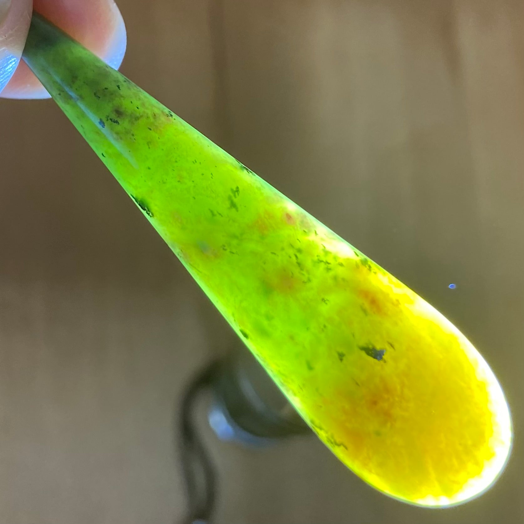 Roimata pendant hand-carved from New Zealand kawawkawa pounamu (greenstone). Translucency.