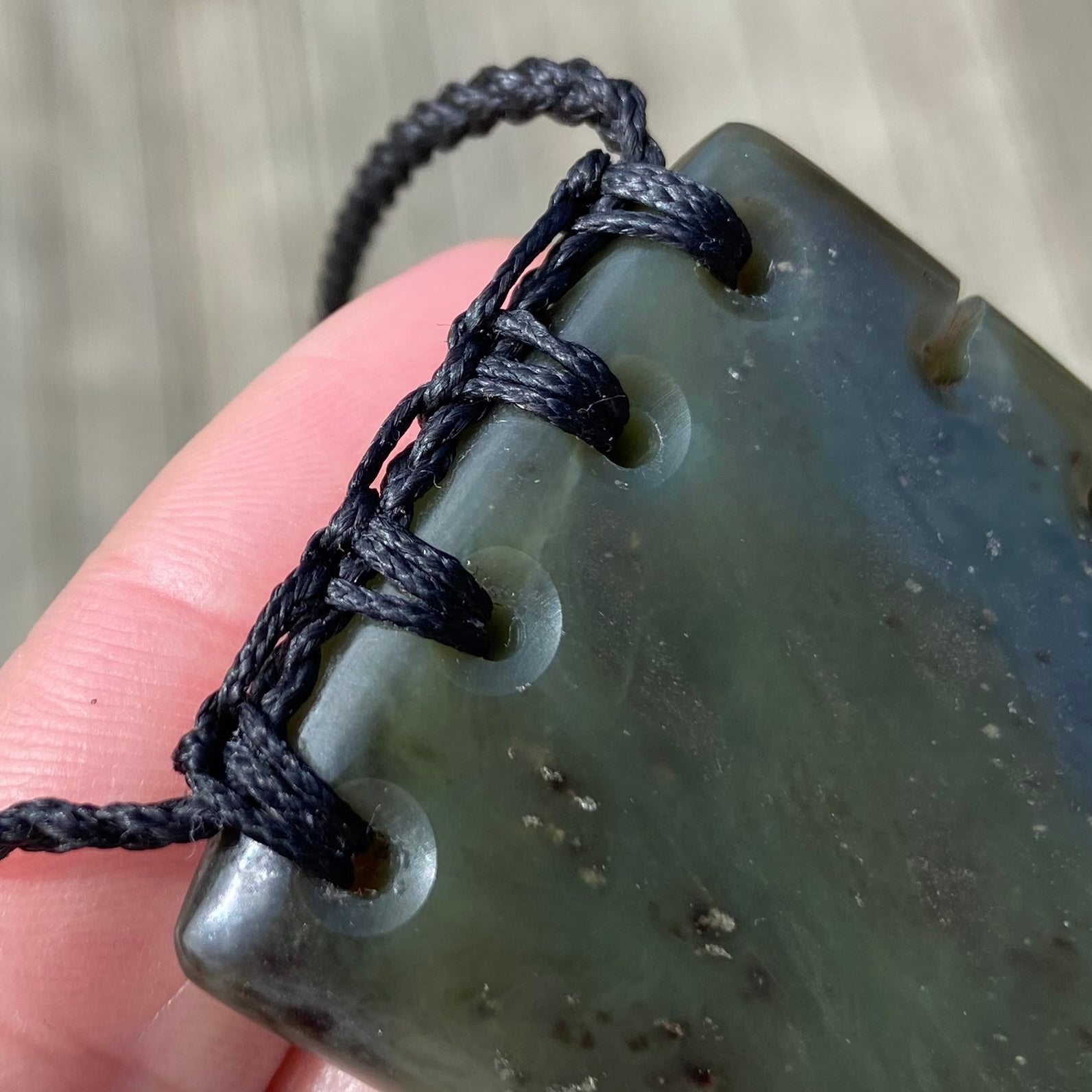 XL Bound Niho Tooth pendant hand-carved from New Zealand Kawakawa pounamu (greenstone). Binding.