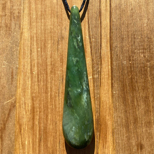 Roimata teardrop pendant hand-carved from New Zealand kawawkawa pounamu (greenstone). Front.