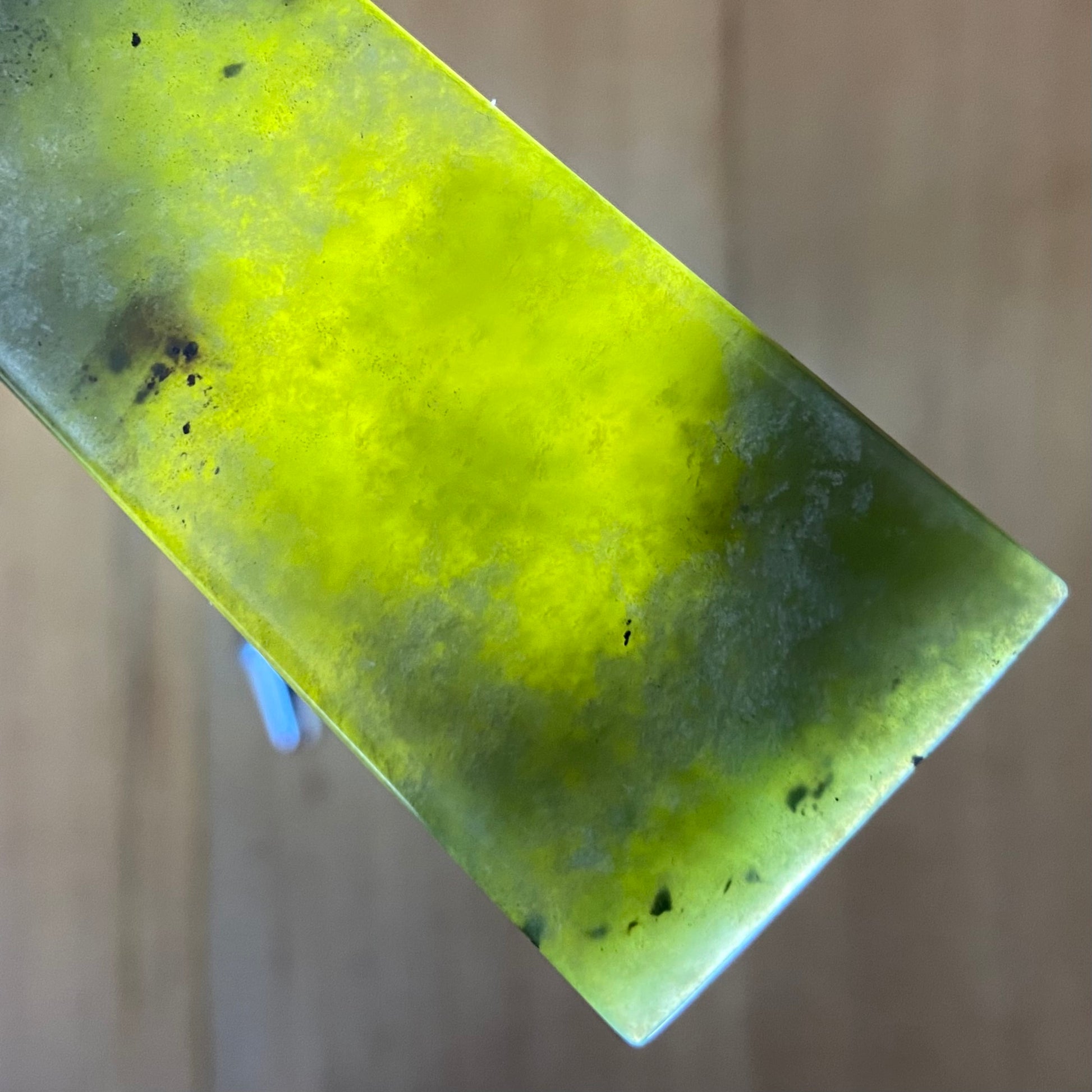 XL Toki pendant hand-carved from New Zealand Kawakawa pounamu (greenstone). Translucency.