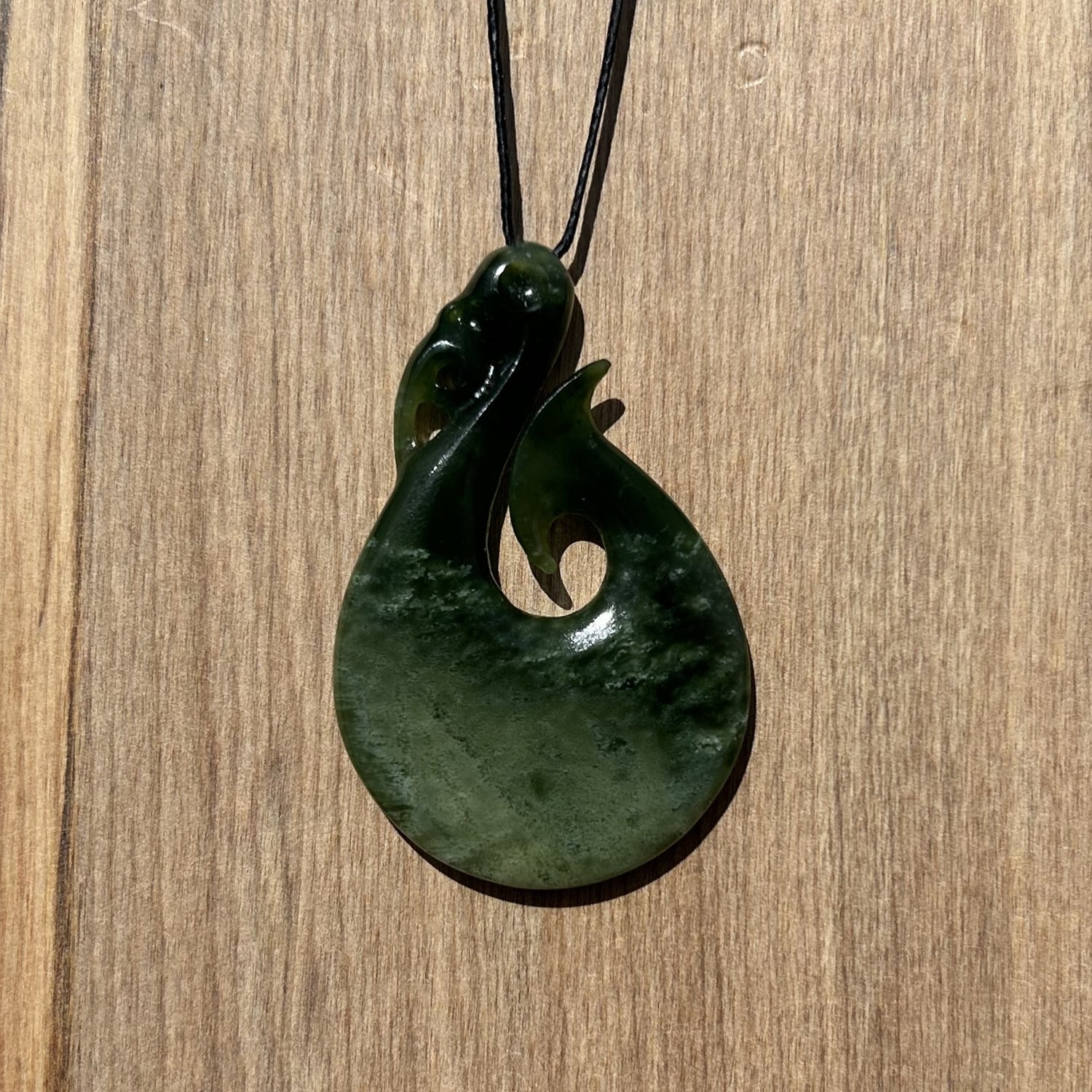 Manaia pendant carved from NZ jade pounamu