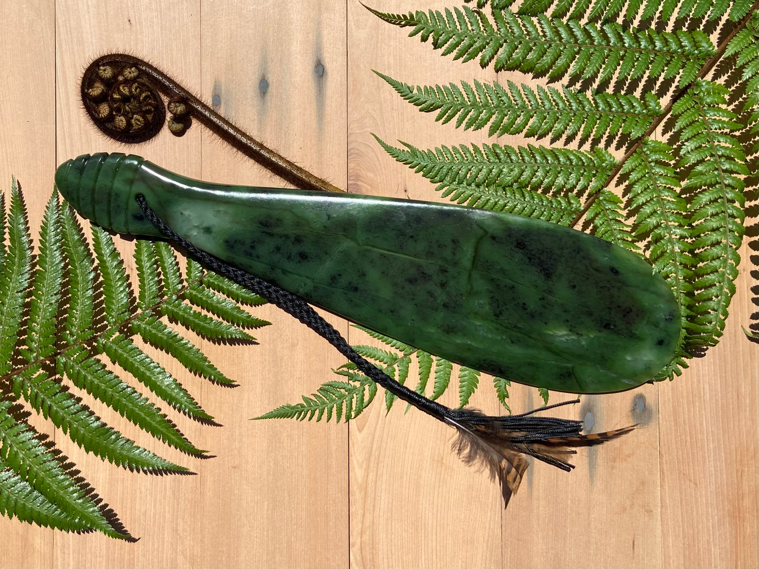 Large mere carved from NZ totoweka jade pounamu